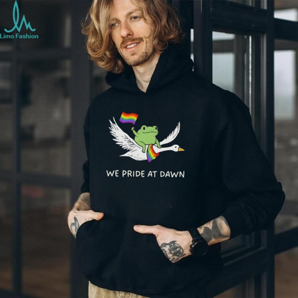 Frog riding goose with rainbow flags featuring we Pride at dawn LGBT shirt