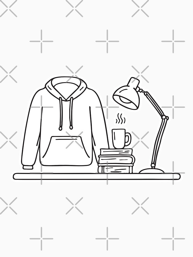 A folded university hoodie placed beside a desk lamp by rasagamastore