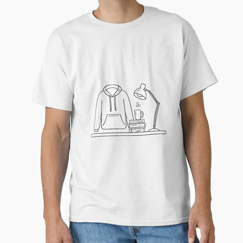 A folded university hoodie placed beside a desk lamp by rasagamastore