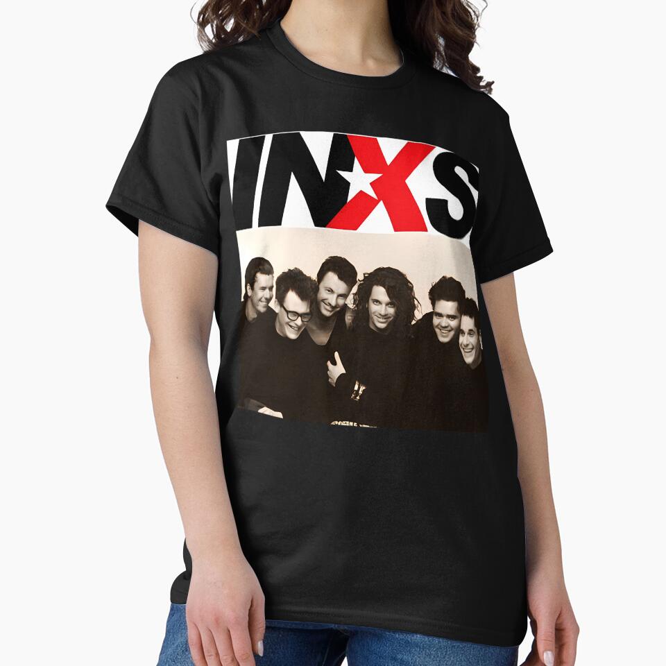 High-Contrast Portrait of Band Members Below a Large by ujjawal
